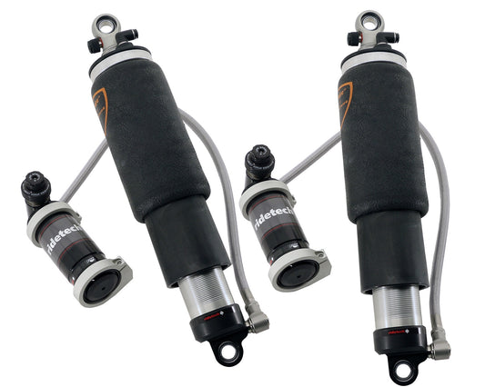 Rear TQ Shockwaves  8000 Series With 4.1" Stroke And 1.7" Eye.